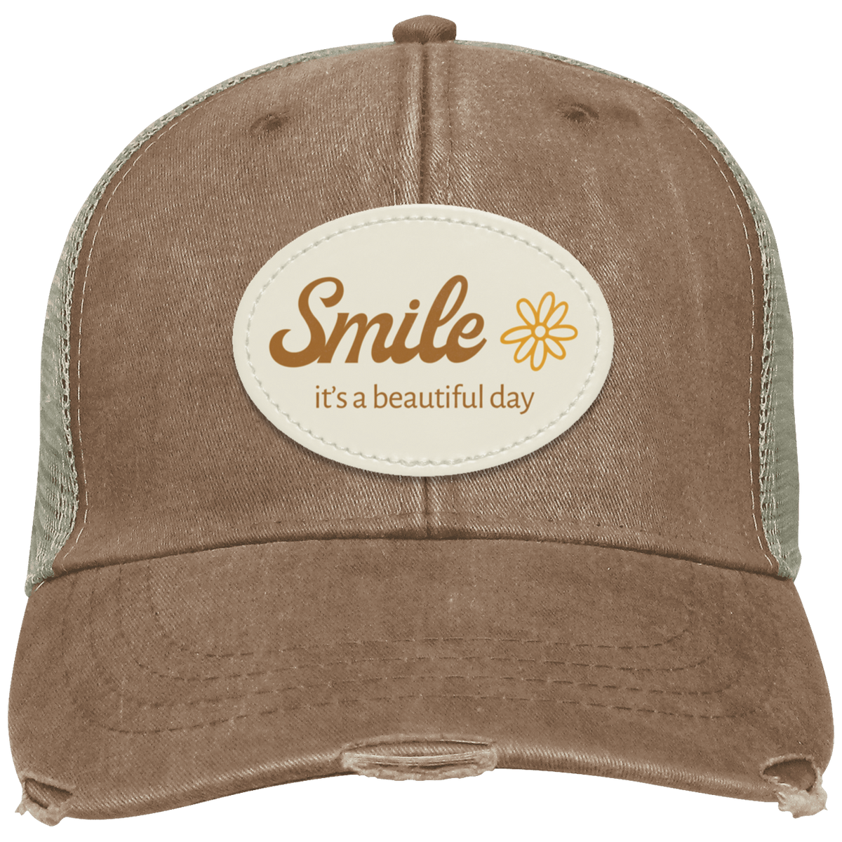 A distressed mudd trucker hat with a cream-colored oval patch on the front that reads 'Smile it's a beautiful day' with a small flower graphic. The back mesh is tan.
