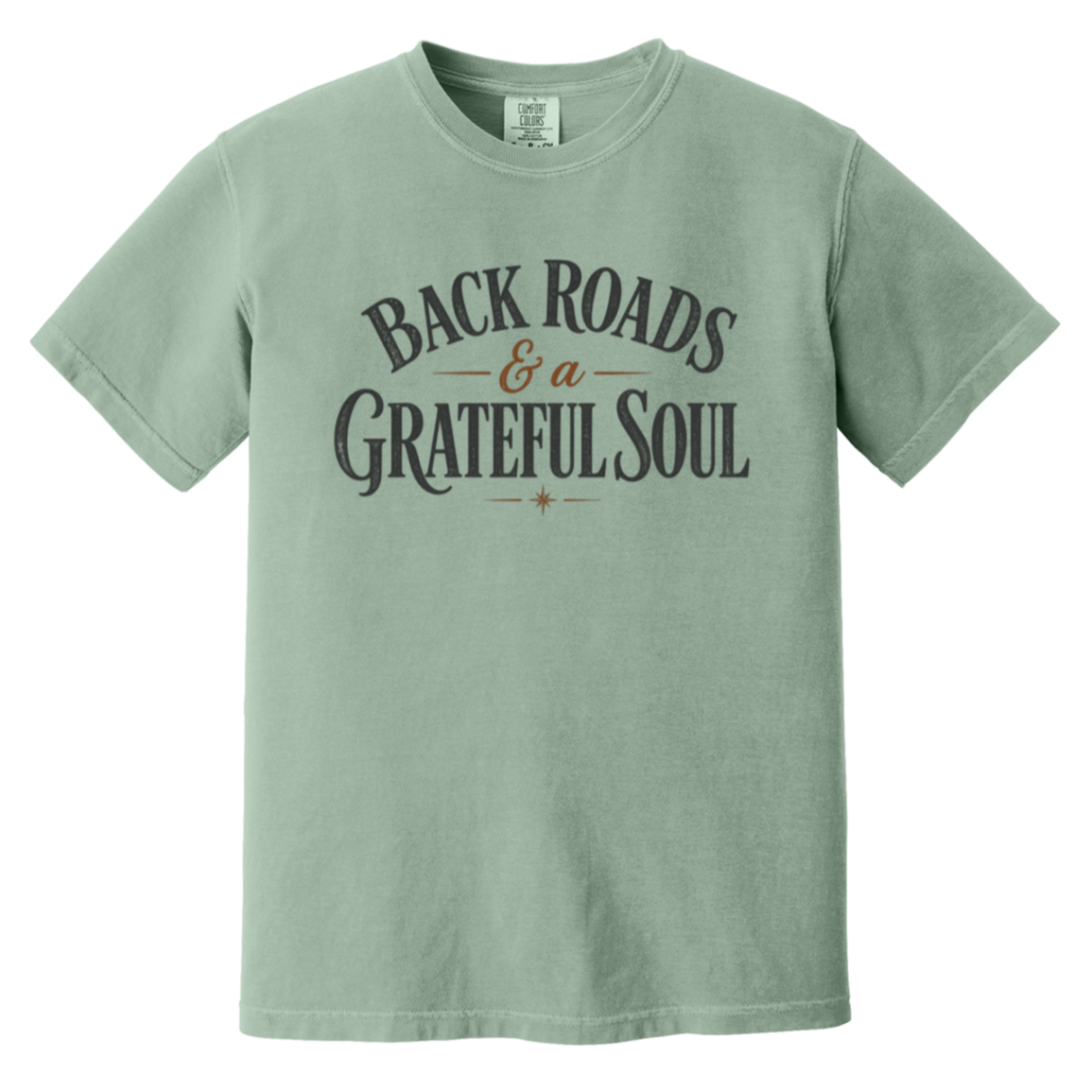 A Bay green short-sleeve t-shirt with a distressed graphic on the chest that reads 'BACK ROADS & a GRATEFUL SOUL' in dark gray and brown lettering.