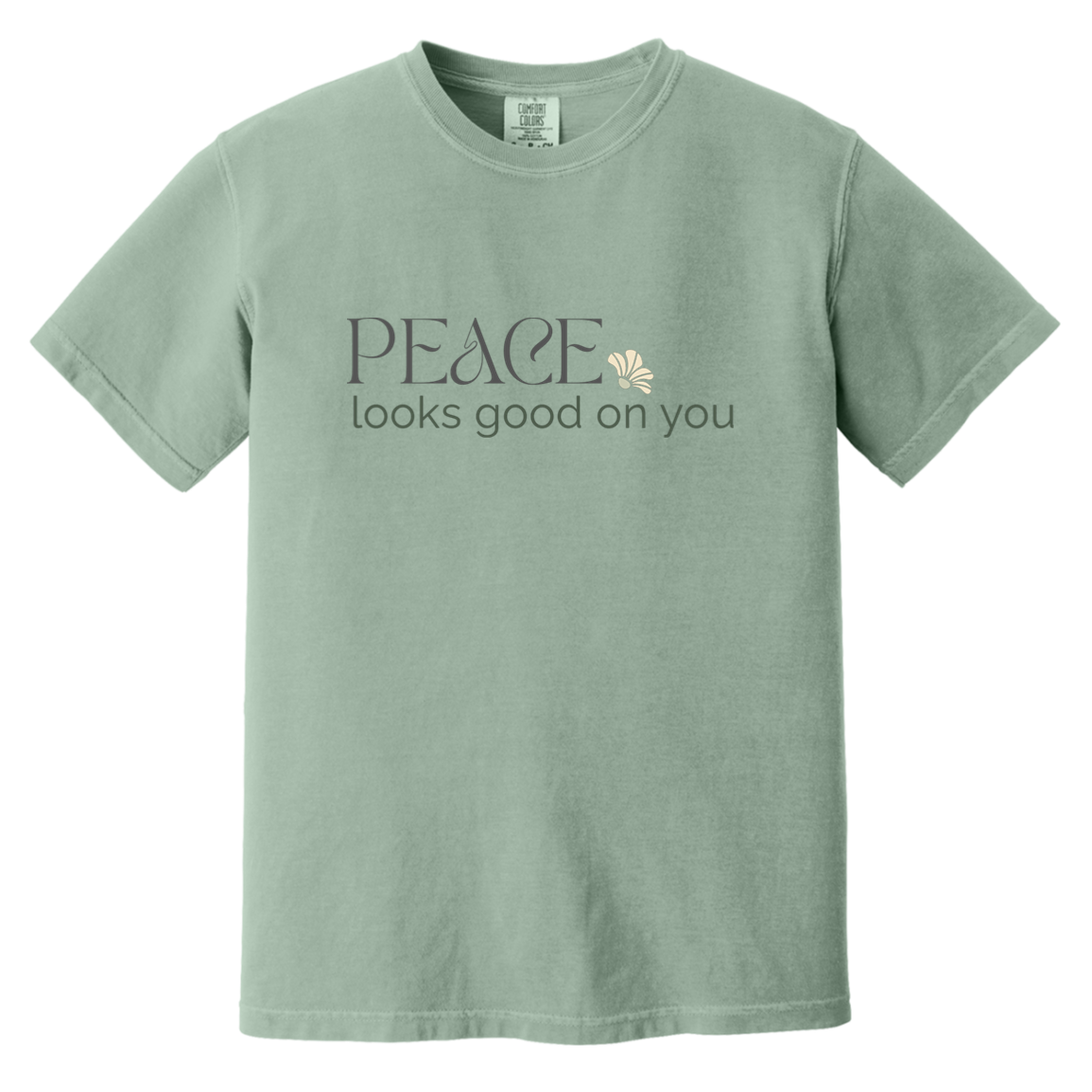 Bay Comfort Colors T-shirt featuring the words “Peace looks good on you” with a small cream flower.
