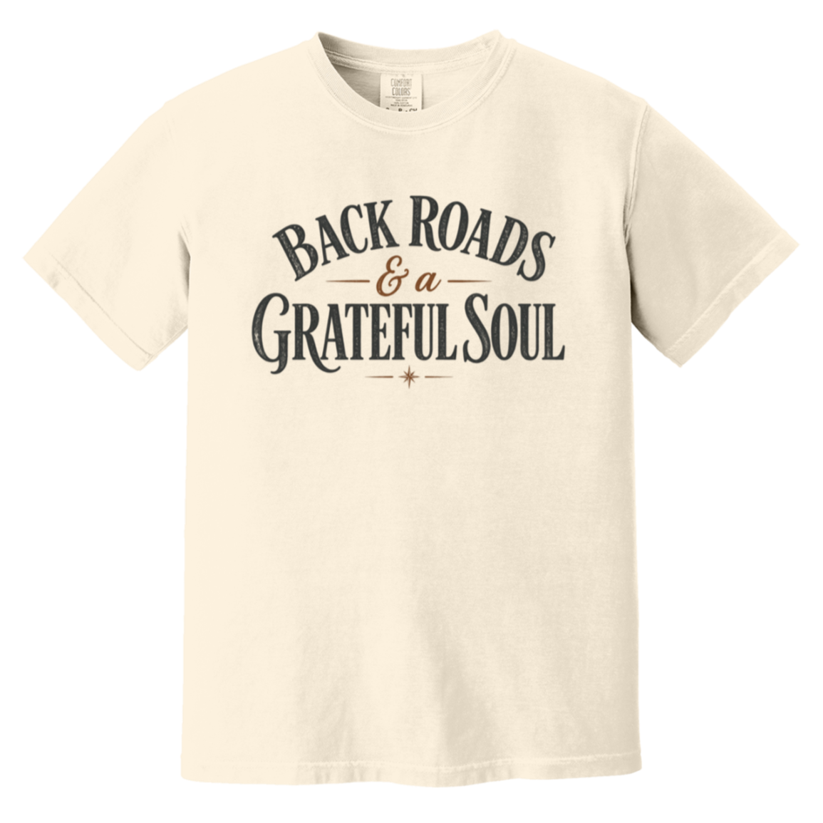 A Bay green short-sleeve t-shirt with a distressed graphic on the chest that reads 'BACK ROADS & a GRATEFUL SOUL' in dark gray and brown lettering.