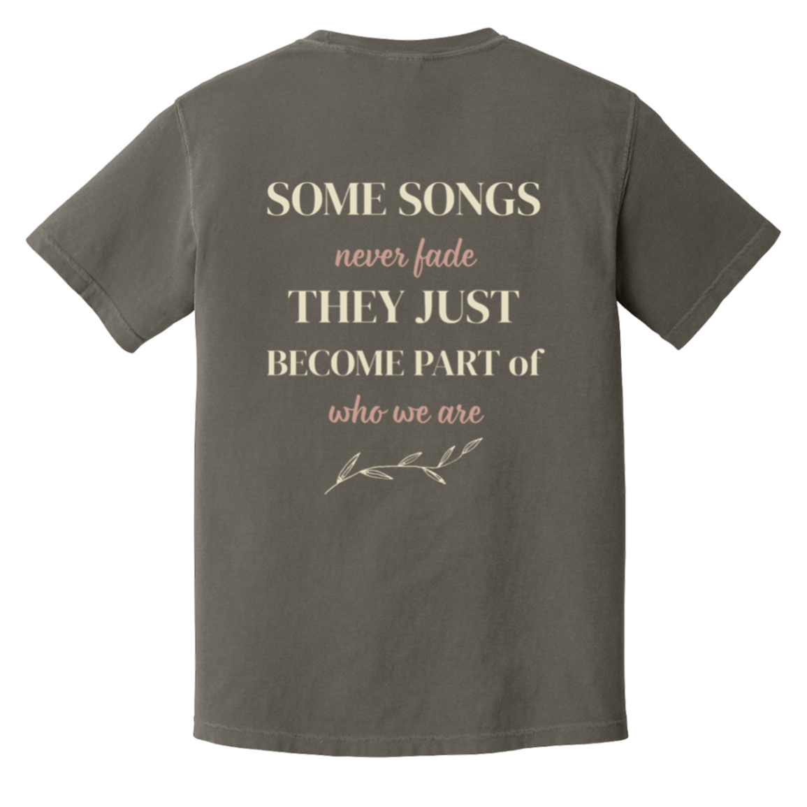 Vintage-inspired back print on the color Pepper Comfort Colors t-shirt featuring the quote "Some Songs Never Fade They Just Become Part of Who We Are" with elegant typography and botanical accent.