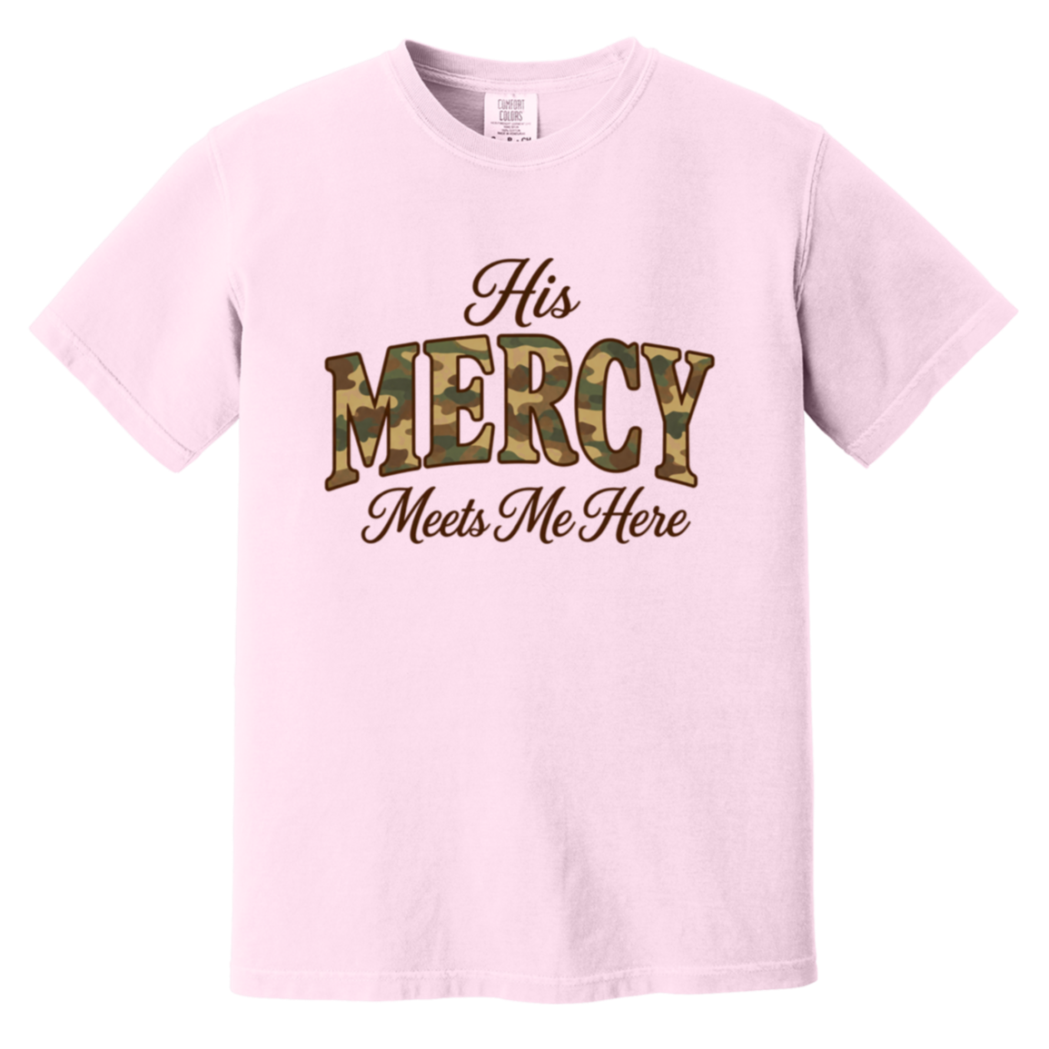 Soft pink Comfort Colors tee with His Mercy Meets Me Here in camo lettering and cocoa script.