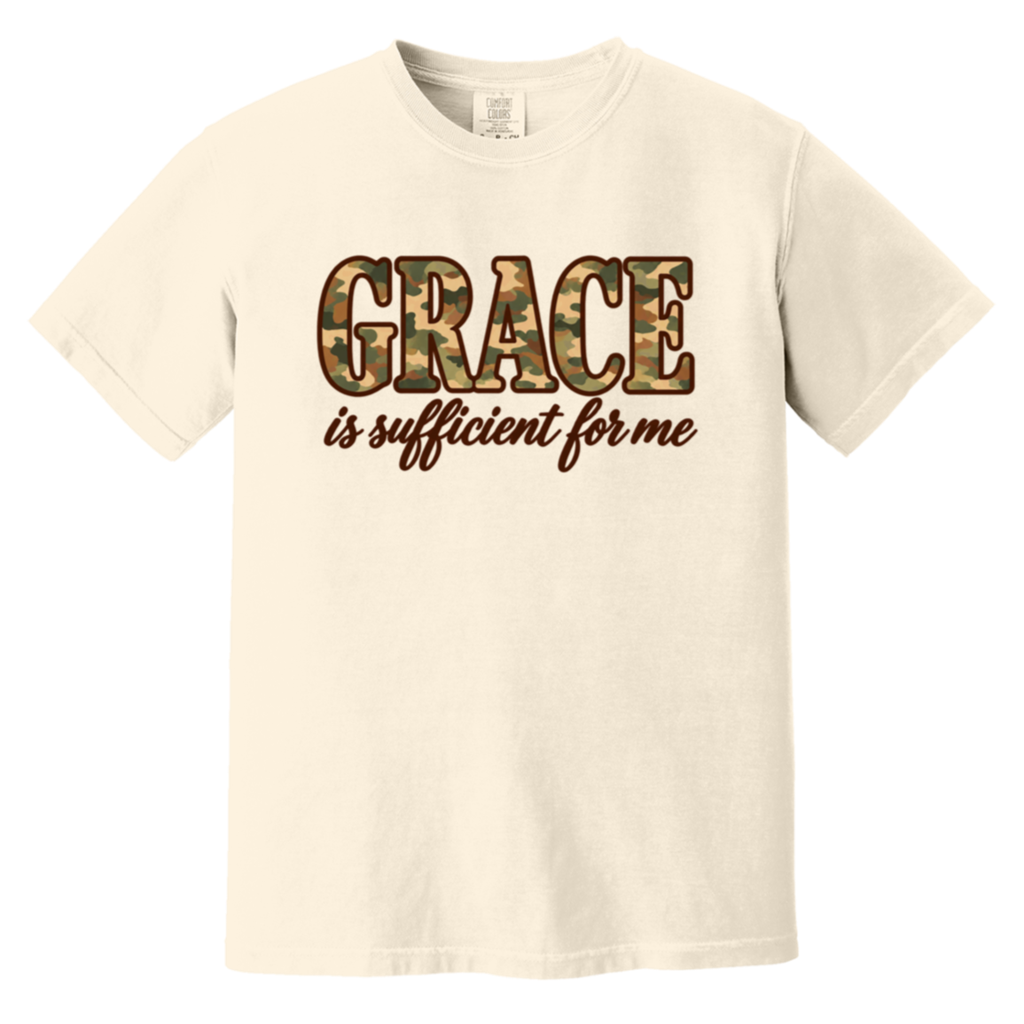 An ivory comfort colors t-shirt featuring the word 'GRACE' in a camouflage pattern block font, with the phrase 'is sufficient for me' written below in brown cursive script.