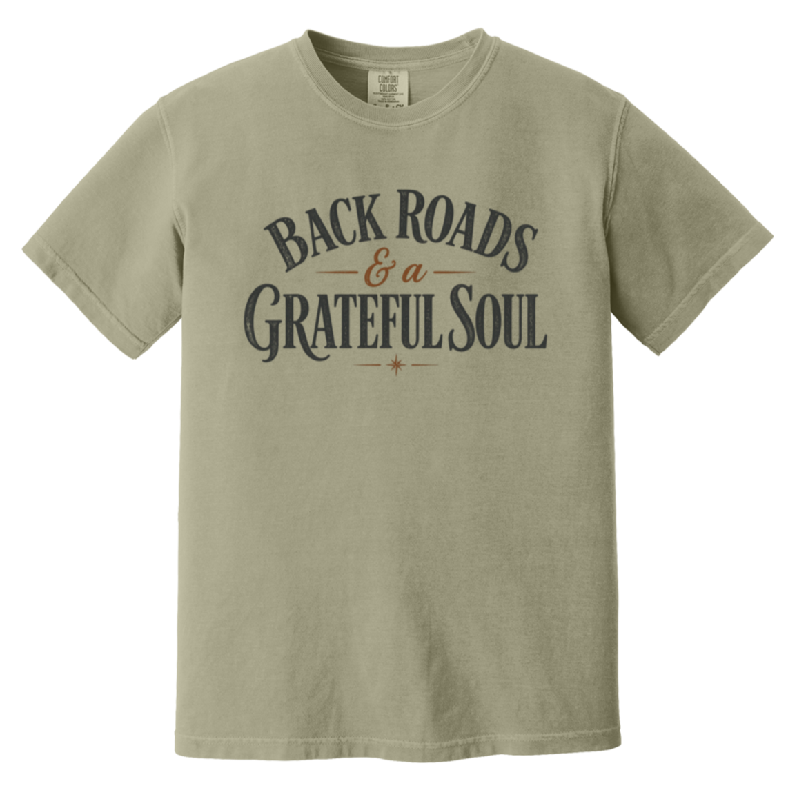 A khaki short-sleeve t-shirt with a distressed graphic print on the front reading 'BACK ROADS & a GRATEFUL SOUL' in dark gray and brown lettering.
