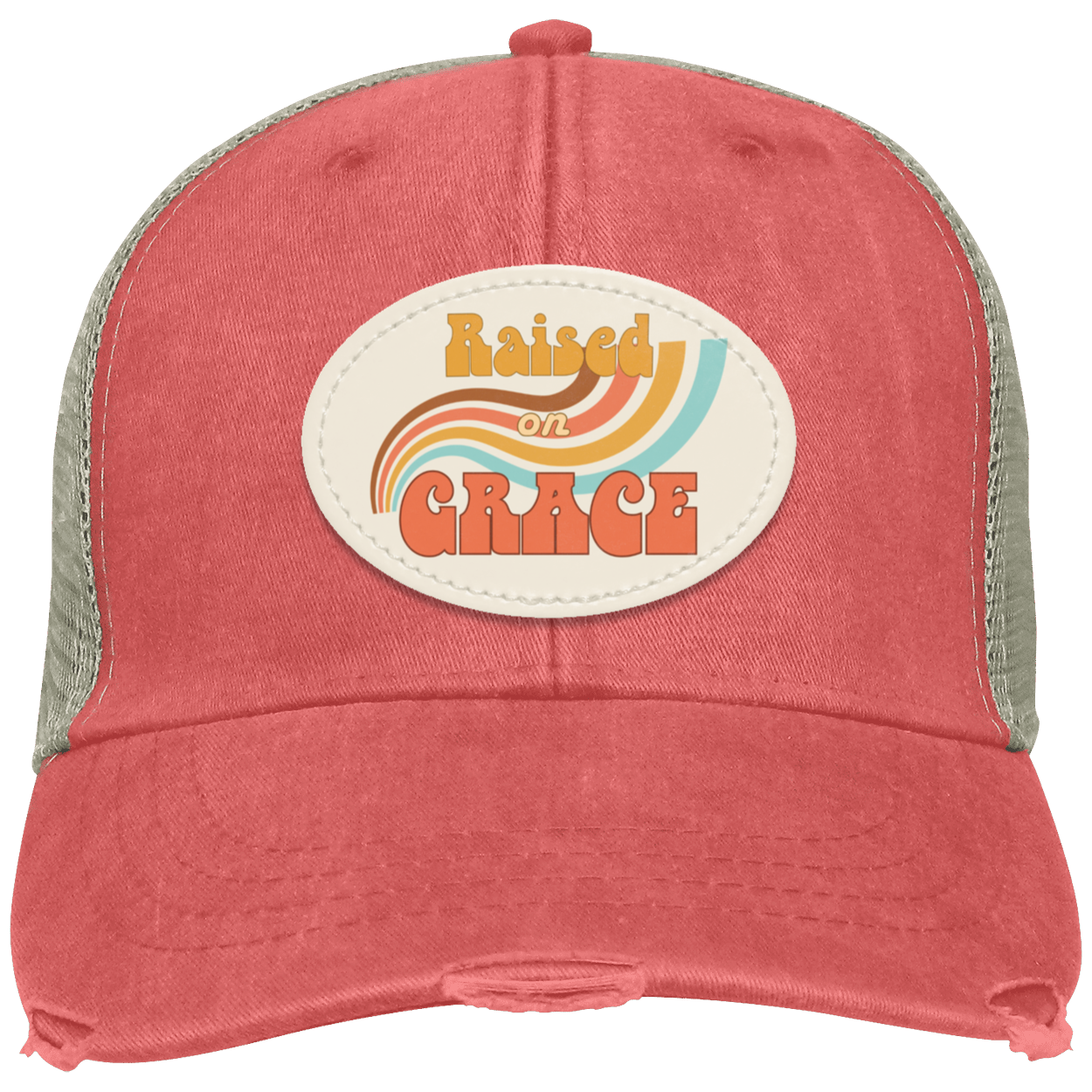 Raised on Grace distressed coral trucker hat featuring a retro oval vegan leather patch with vintage rainbow design.