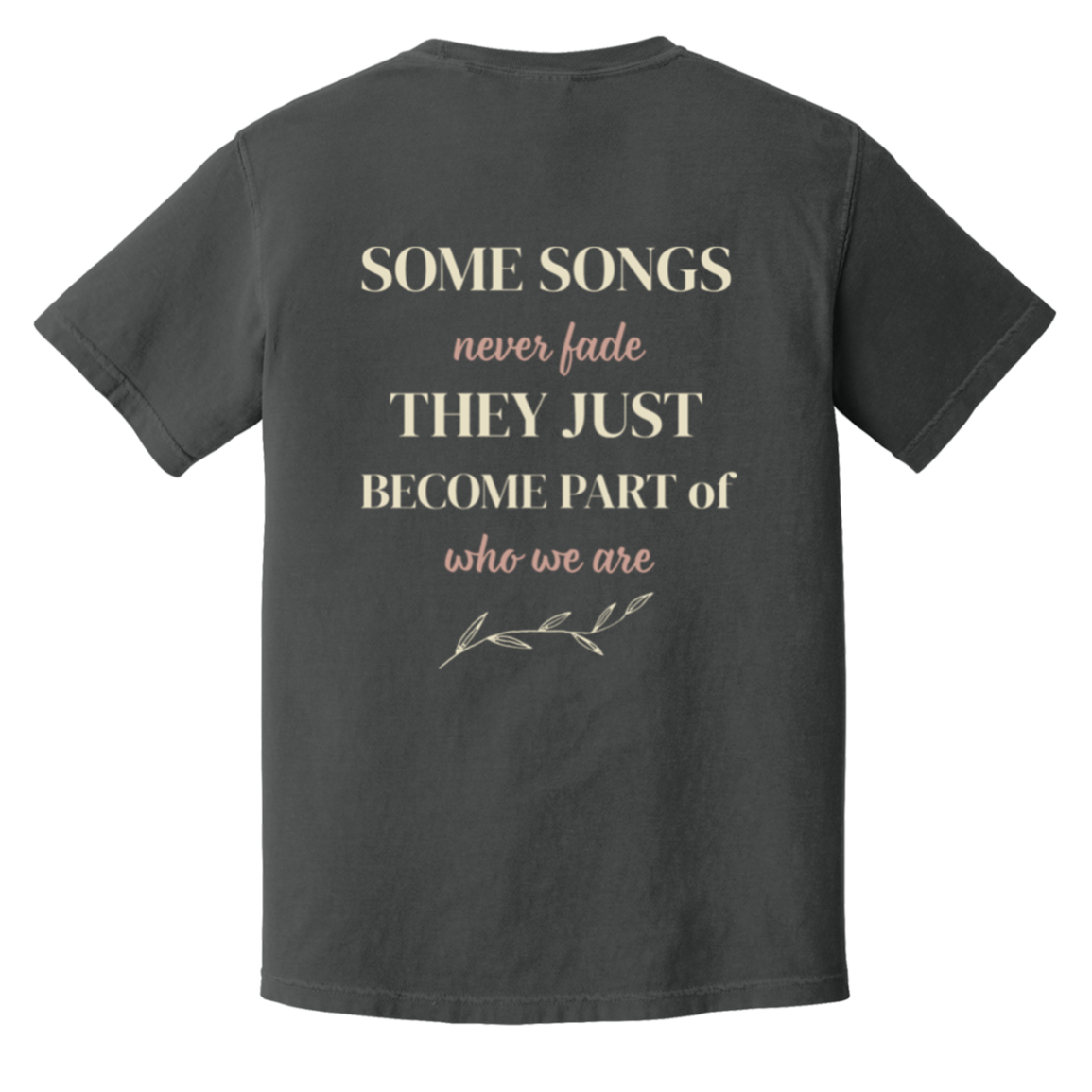 Vintage-inspired back print on the color Graphite Comfort Colors t-shirt featuring the quote "Some Songs Never Fade They Just Become Part of Who We Are" with elegant typography and botanical accent.