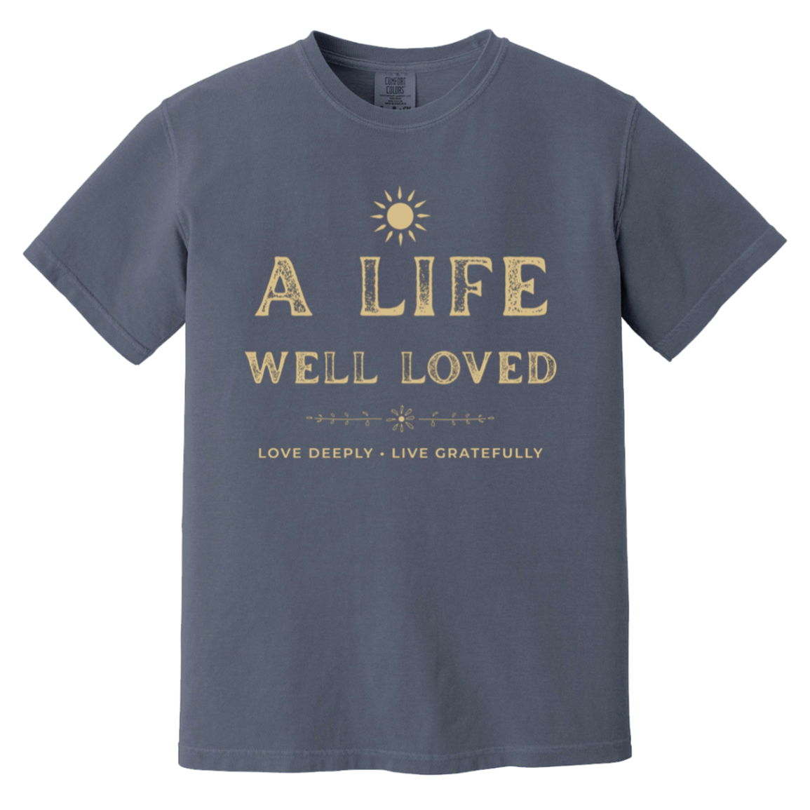 Vintage A Life Well Loved graphic T-shirt in garment-dyed denim with distressed cream lettering and sun detail