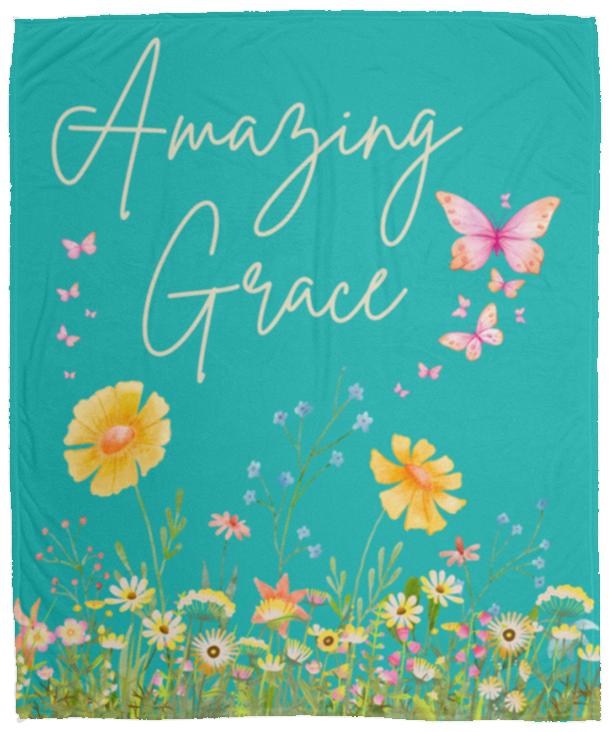 Amazing Grace inspirational plush fleece blanket with floral garden artwork, butterflies, teal background, and Christian faith-inspired message for cozy home decor.