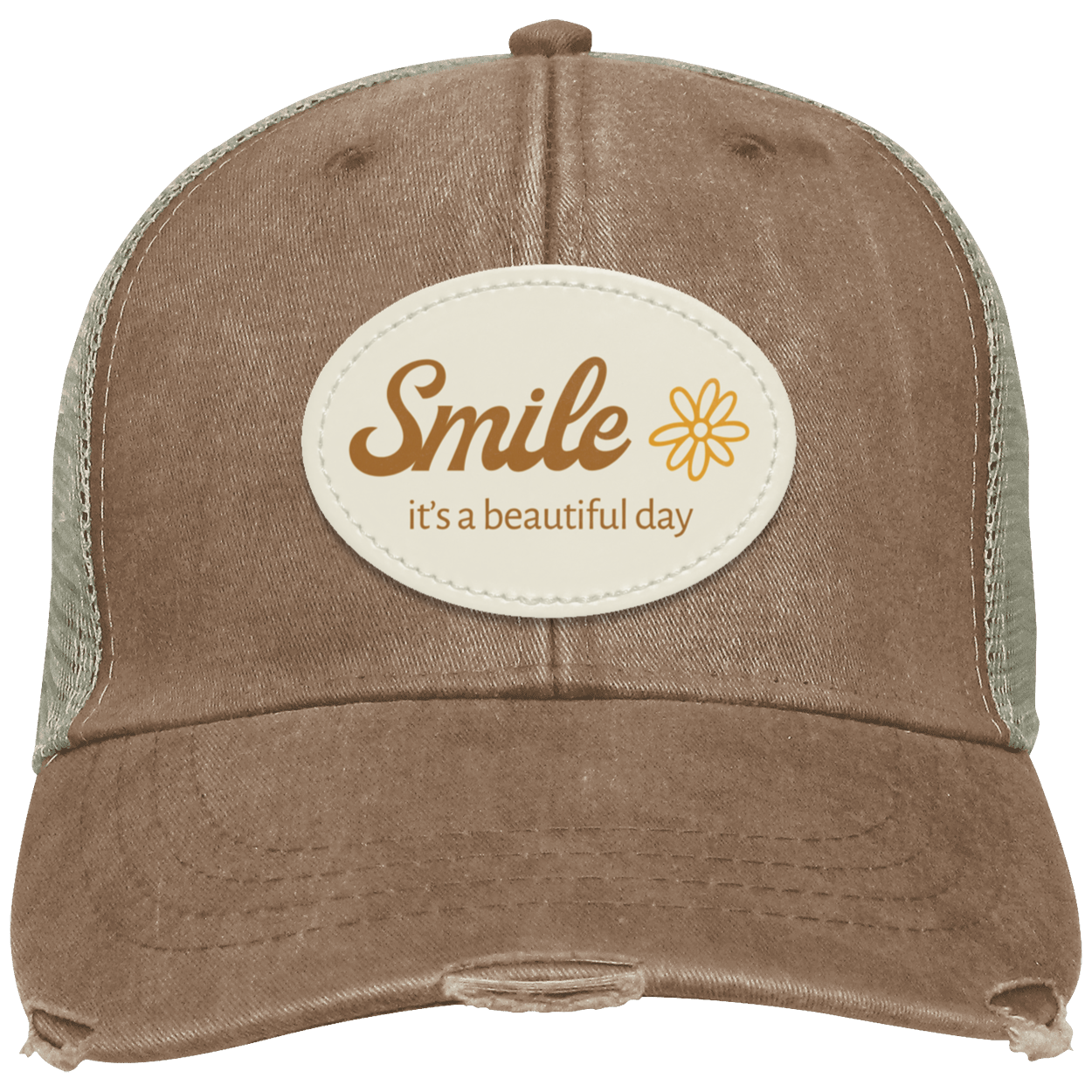 A distressed mudd trucker hat with a cream-colored oval patch on the front that reads 'Smile it's a beautiful day' with a small flower graphic. The back mesh is tan.