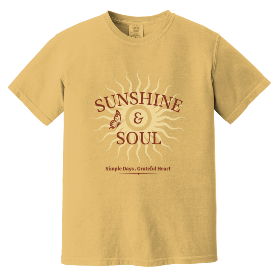 Sunshine & Soul Comfort Colors® mustard garment-dyed t-shirt featuring a vintage sunburst design with distressed maroon and cream lettering and the phrase "Simple Days • Grateful Heart."