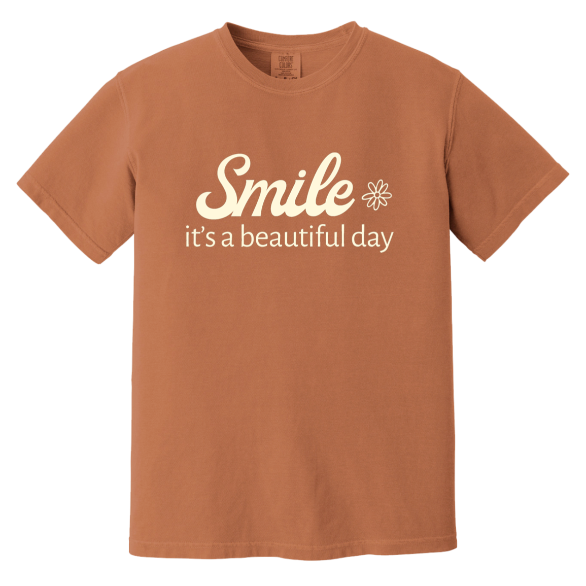 Yam Comfort Colors T-shirt featuring the cream words “Smile, it’s a beautiful day” with a small flower.