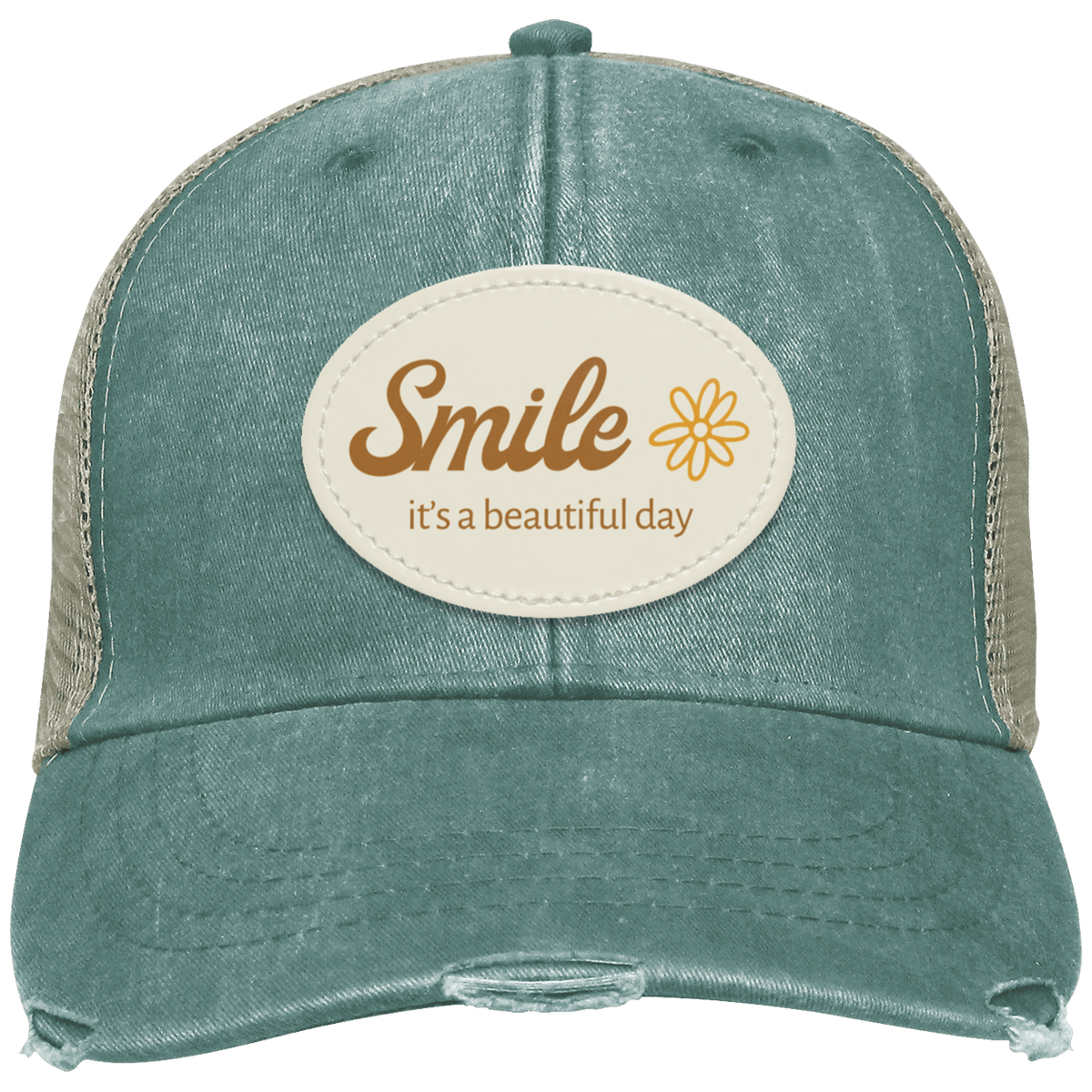 A distressed trucker-style cap in washed forest with tan mesh side panels and a cream oval patch on the front that reads 'Smile it's a beautiful day' with a small flower graphic.
