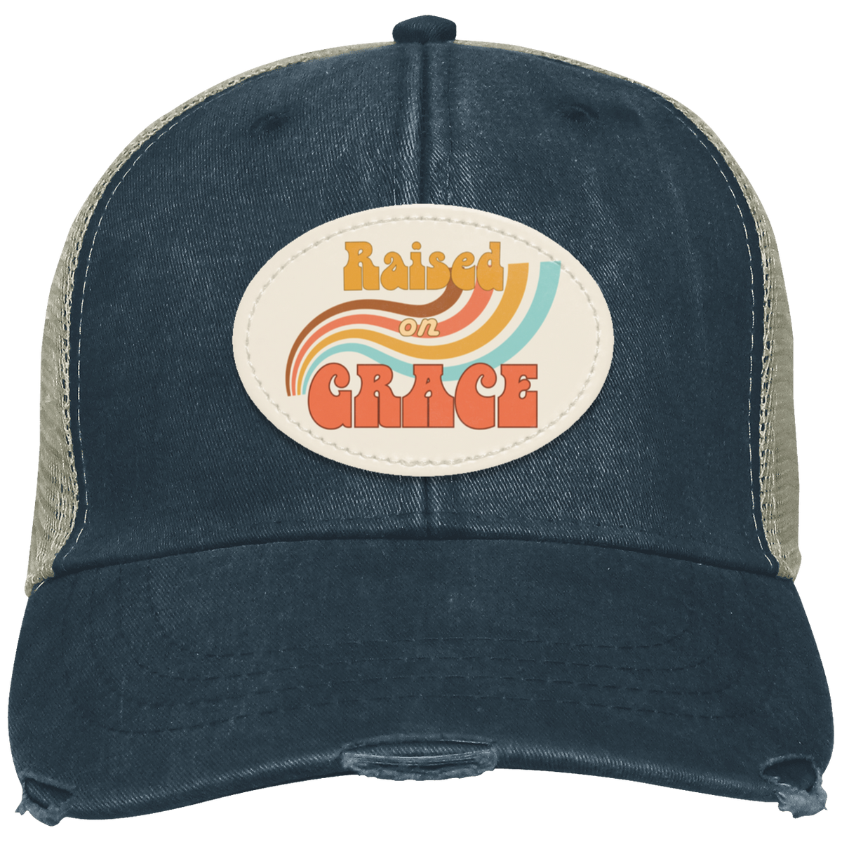 Raised on Grace distressed navy trucker hat with a retro-inspired oval vegan leather patch.