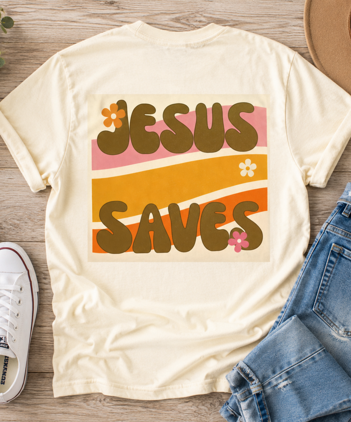 Retro Jesus Saves Comfort Colors t-shirt with vintage waves, floral accents, and groovy typography on an ivory garment-dyed tee.