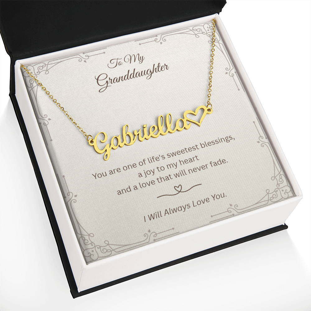 Gold granddaughter name necklace displayed in standard gift box